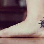 Wind roses tattoo - na stopie